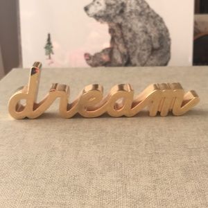 Freestanding Dream sign in gold